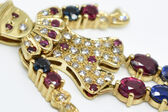 pendant “harlequin” 14 K Rubies, Sapphires 