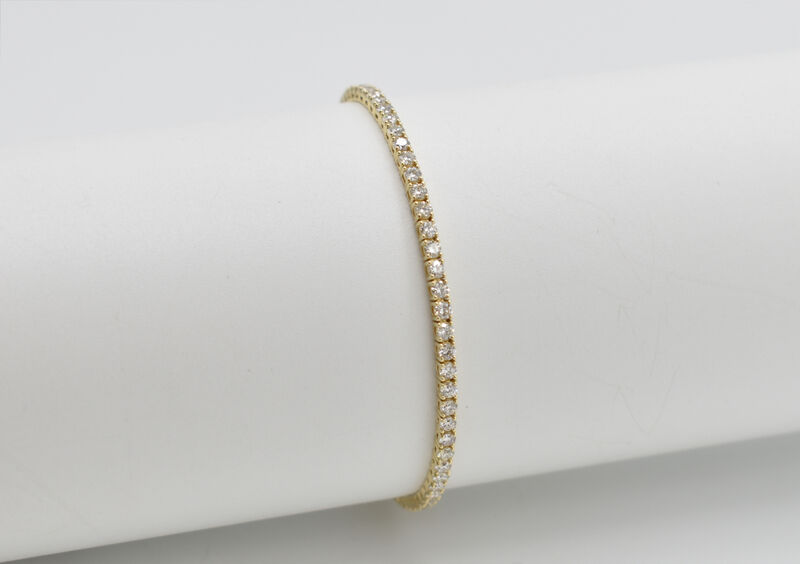 tennis bracelet 14 K diamonds