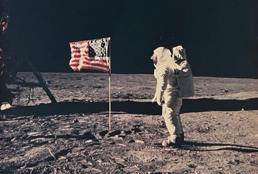 Buzz Aldrin beside the US flag, 1969